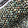 Load image into Gallery viewer, African Turquoise Faceted Round Beads 16 Facets 8mm