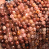 Load image into Gallery viewer, Copper Rutilated Quartz Faceted Round Beads 128 Facets 8mm